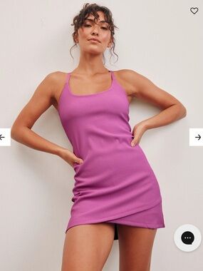 NWOT BEYOND YOGA THE LINED MINI DRESS SMALL SUNSET VIOLET RIBBED TENNIS PINK